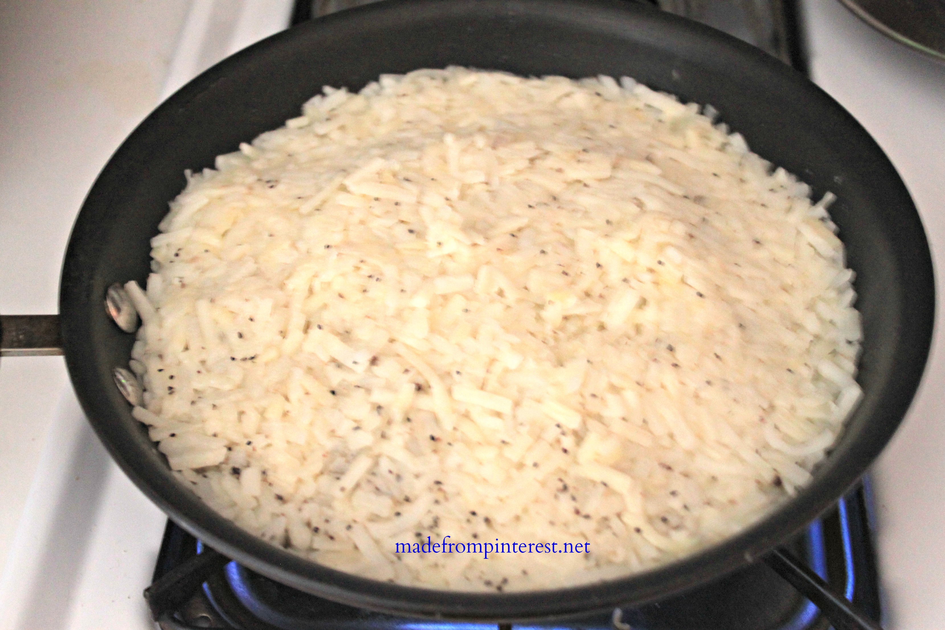 Heaping Helping Hash Browns in the pan @madefrompinterest.net