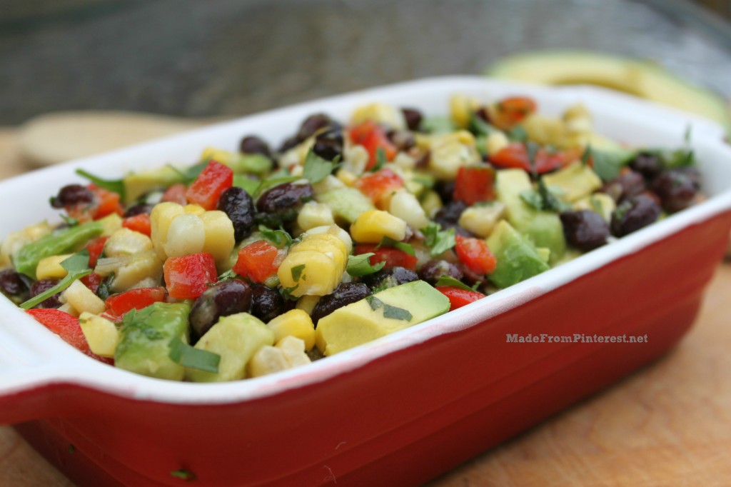 If you don't want to bring leftovers home from the pot luck, this is the recipe you want to make! Corn, Black Bean, Avocado,Cilantro Salsa recipe at the site with the crazy sisters of MadeFromPinterest.net
