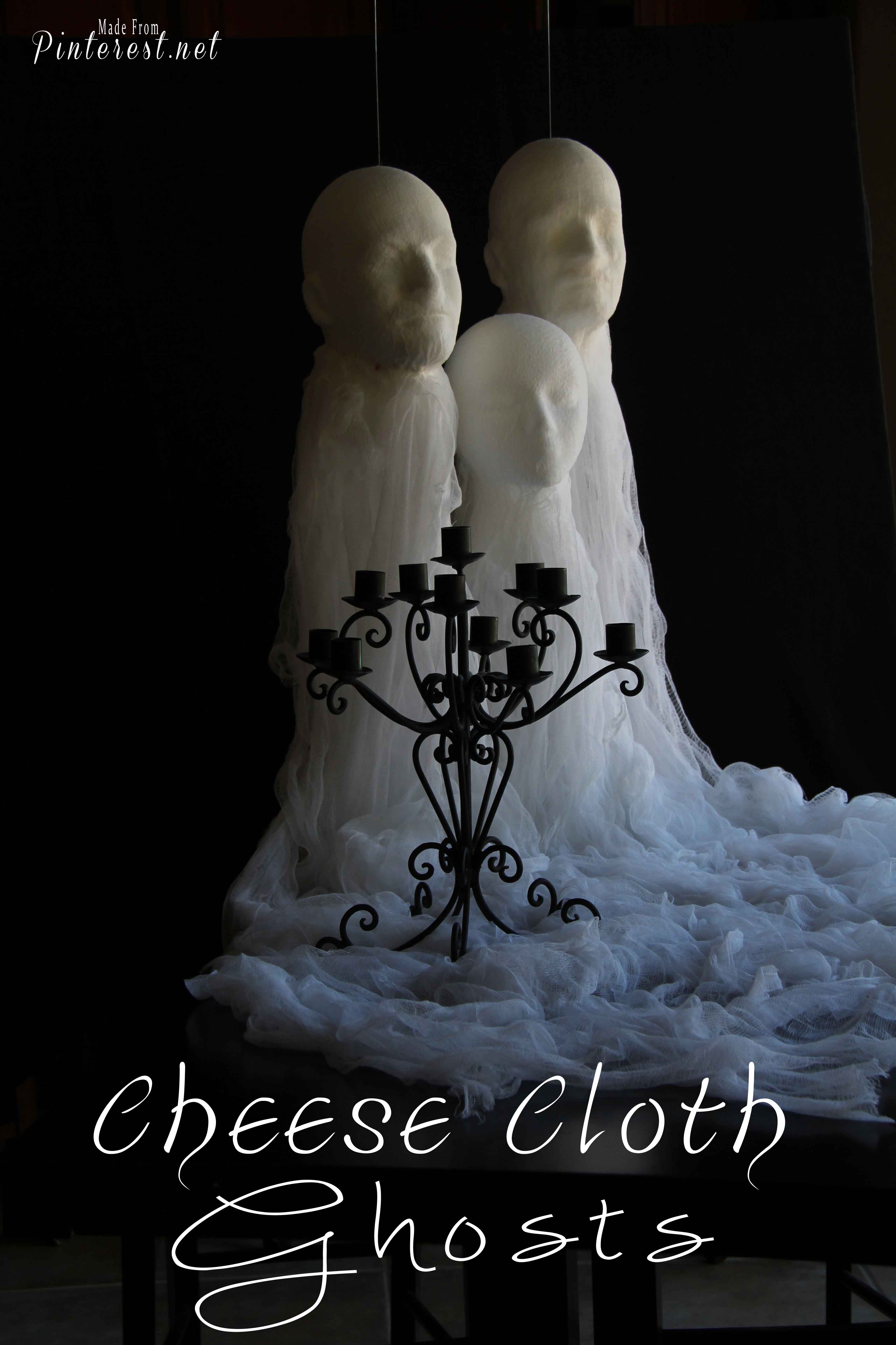 Cheese Cloth Ghosts - Make these creepy looking ghosts with cheese cloth, glue and wig heads. Awesome decorations for Halloween! #Halloween #Decorations #Ghosts #Spirits
