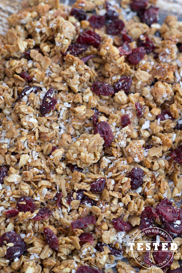 White Chocolate & Craisen Granola - This will ruin any other granola experience for you, it's that good! The sweet and tangy flavors combine to make this the best granola ever! Watching your sugar intake? No worries, the regular recipe has also been converted to a sugar free version that tastes just as good as the original. Everyone can have their granola and eat it too! #Recipe #Granola Recipe #Craisen #Chocolate