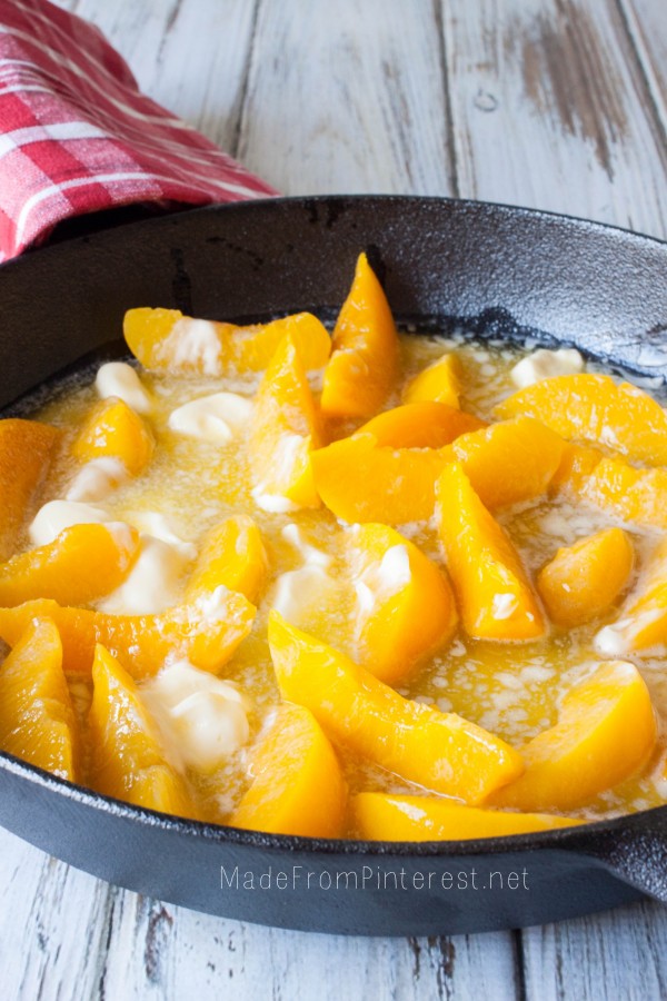Two Two Easy Peach Cobbler starts with peaches and melted butter. Now that's got to be good!