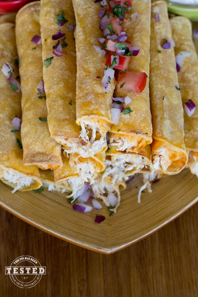 Crockpot Cream Cheese Taquitos - Use your crockpot to make this moist flavorful creamy chicken. Fill flour or corn tortillas with cream cheese chicken and cheese, bake and enjoy! These are fantastic!