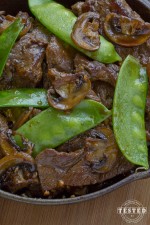 Asian Beef with snow peas and mushrooms in homemade sauce. Tender sirloin steak strips sautéed in fresh garlic.make this dish incredible.