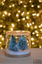 Christmas Snow Globes - Make a charming Christmas snow globe in no time with a few craft supplies. They will bring the magic of Christmas wherever you display them!